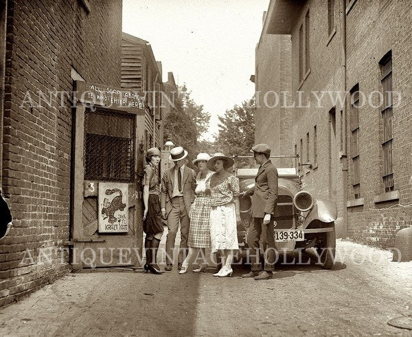 Visitors at the entrance to the iconic bohemian club and speakeasy Krazy Kat Klub (The Kat) in Washington, D.C., July 1921. A00017
