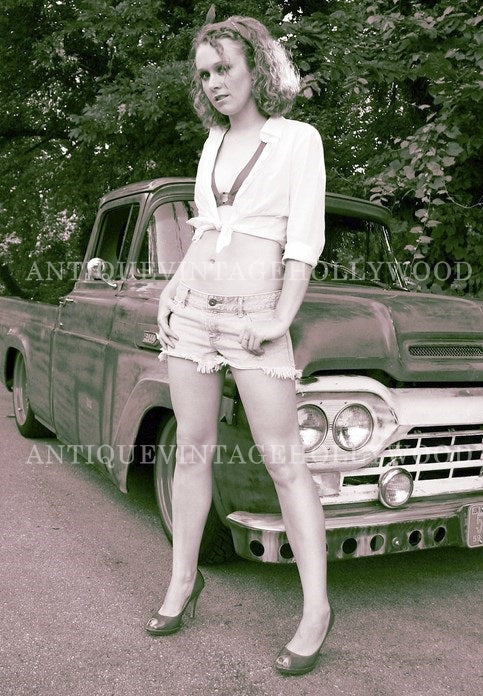 Model Lindsay Morrissey at a photo shoot with the Ford F100. A00032